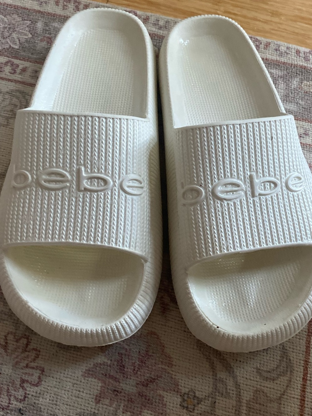 Bebe white sandal slides . They say size 9, but they are more like a 10 1/2..